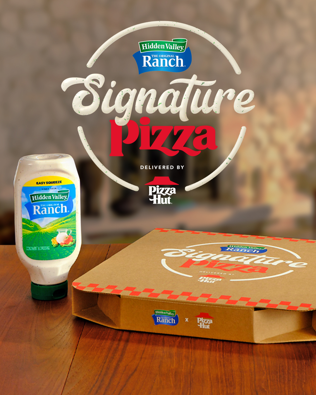 A Hidden Valley® Ranch Easy Squeeze bottle and a closed box of pizza with the signature pizza logo above