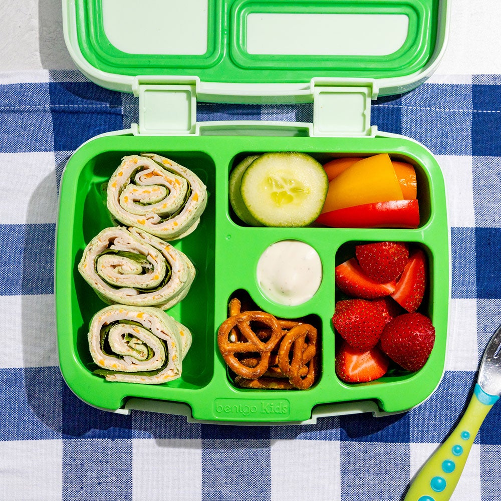 Lunchbox with sandwich, fruit, and veggies